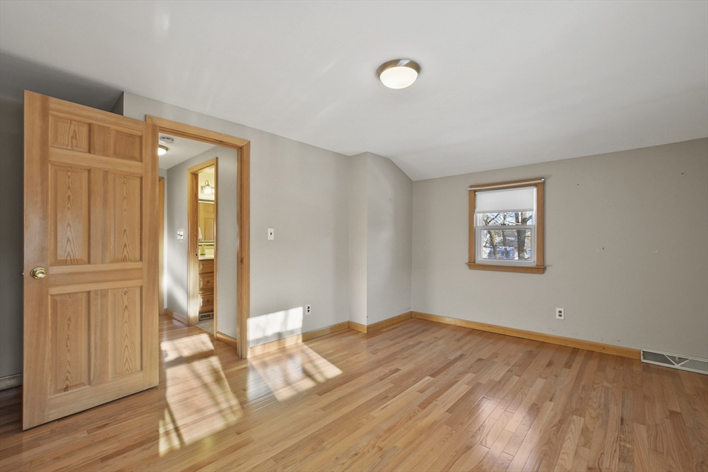 2 Market Street Billerica, MA 01821 - Photo 25 of 34 a view of a room with wooden floor and windows