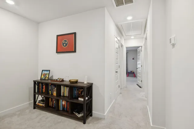 a view of a hallway with workspace