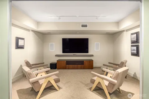 a living room with a couch and a flat screen tv