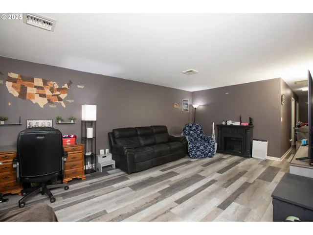 a bedroom with a bed and a mirror