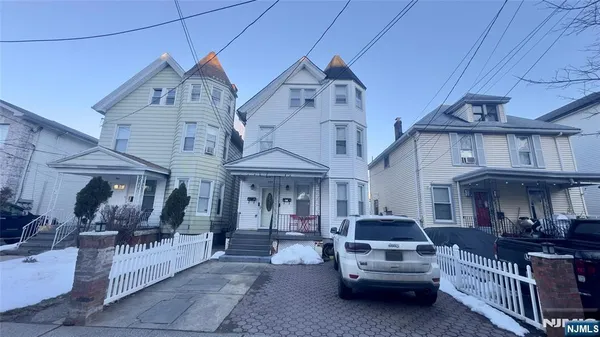 a front view of a building with glass windows