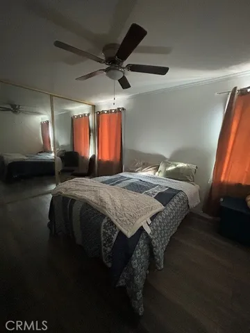a dining room with a table chairs and a chandelier