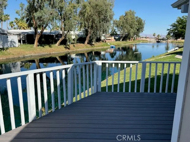 a view of balcony with furniture