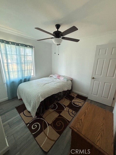 578 Channel Way Needles, CA 92363 - Photo 8 of 20 a bedroom with a bed and a window