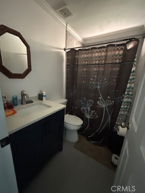 578 Channel Way Needles, CA 92363 - Photo 9 of 20 a bathroom with a sink vanity mirror and toilet