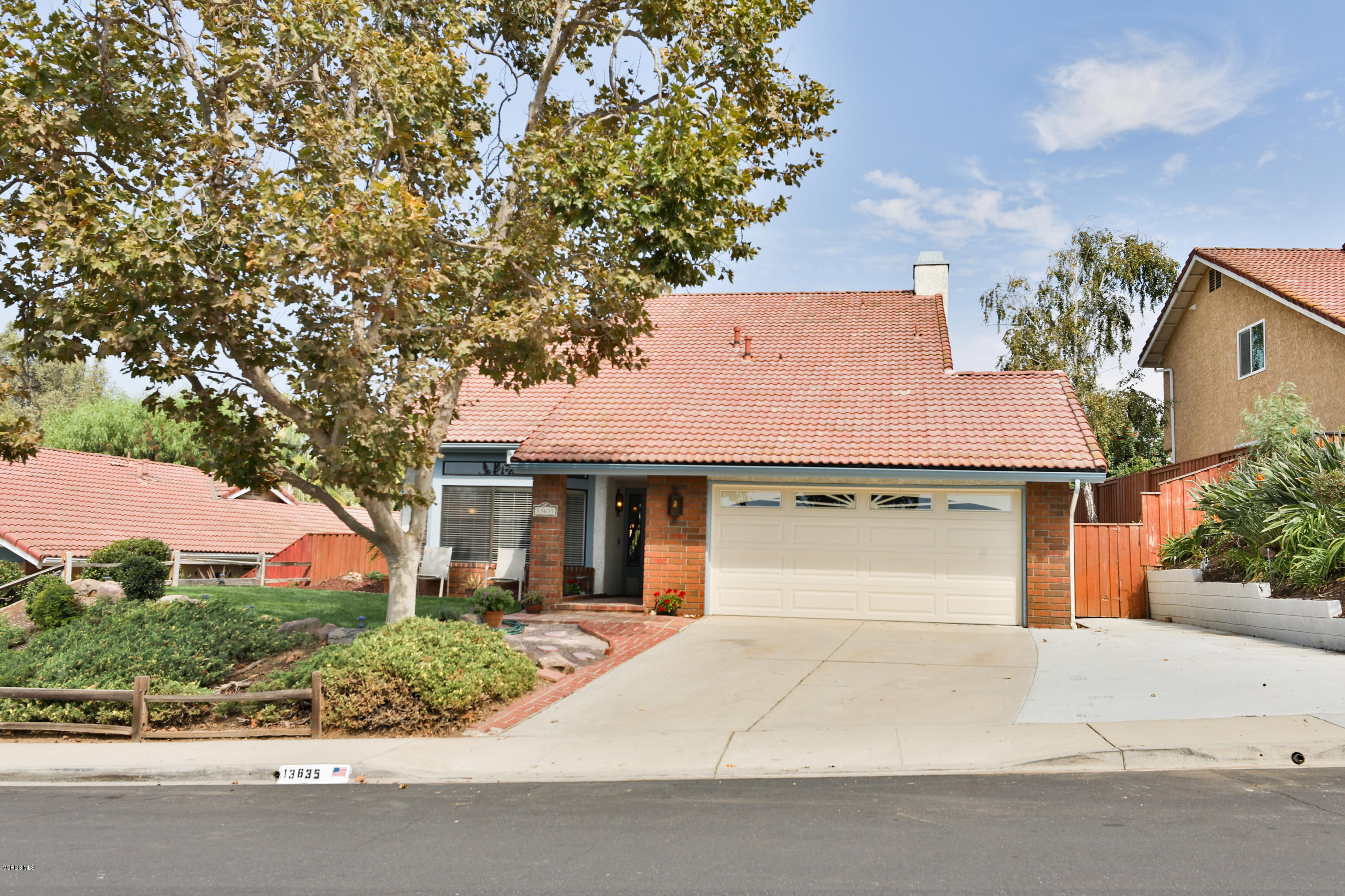 13635 Gunsmoke Road Moorpark, CA 93021 - Photo 1 of 34 front view of house with a yard