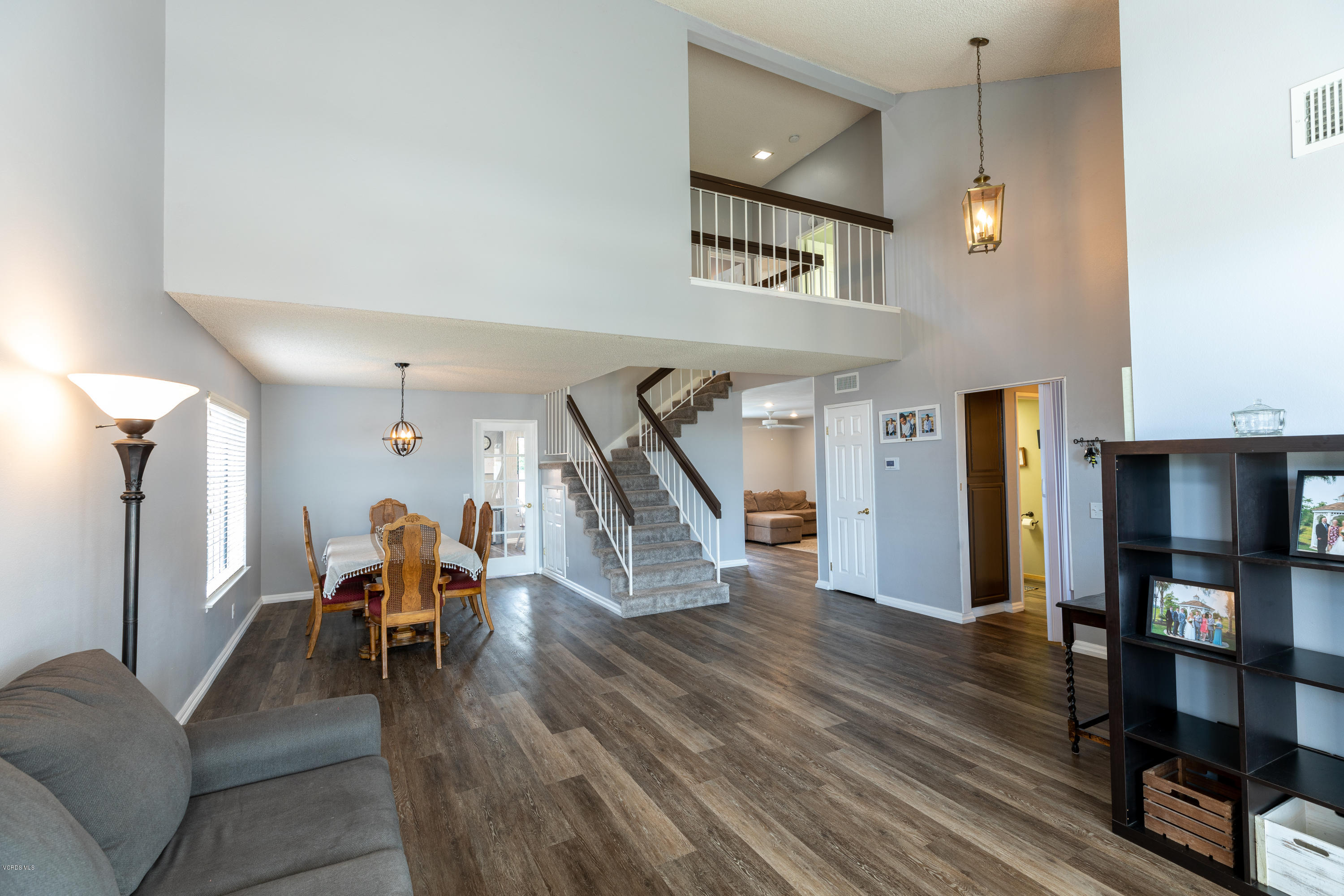 13635 Gunsmoke Road Moorpark, CA 93021 - Photo 15 of 34 a living room with furniture and a wooden floor