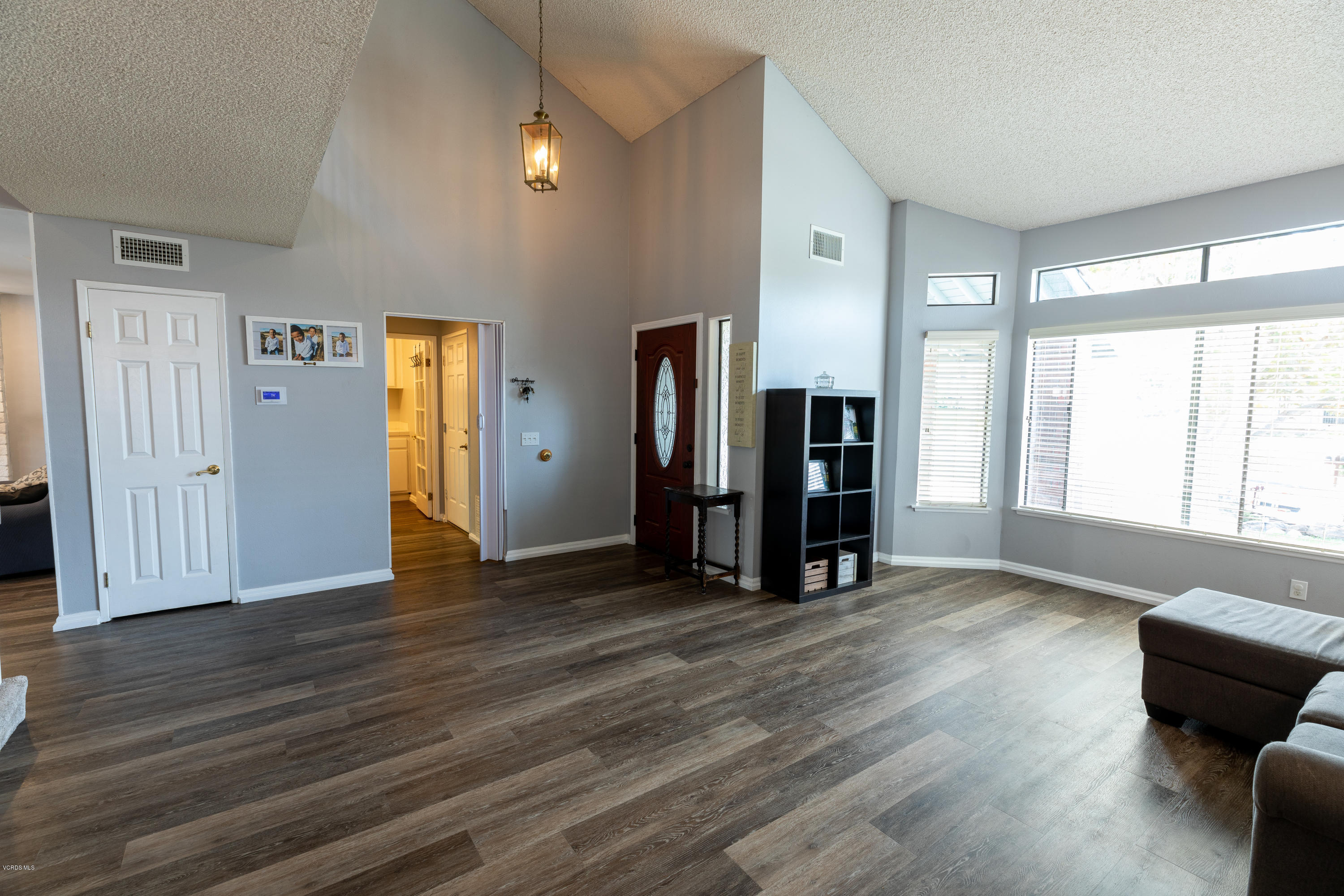 13635 Gunsmoke Road Moorpark, CA 93021 - Photo 16 of 34 a view of an empty room with window and wooden floor