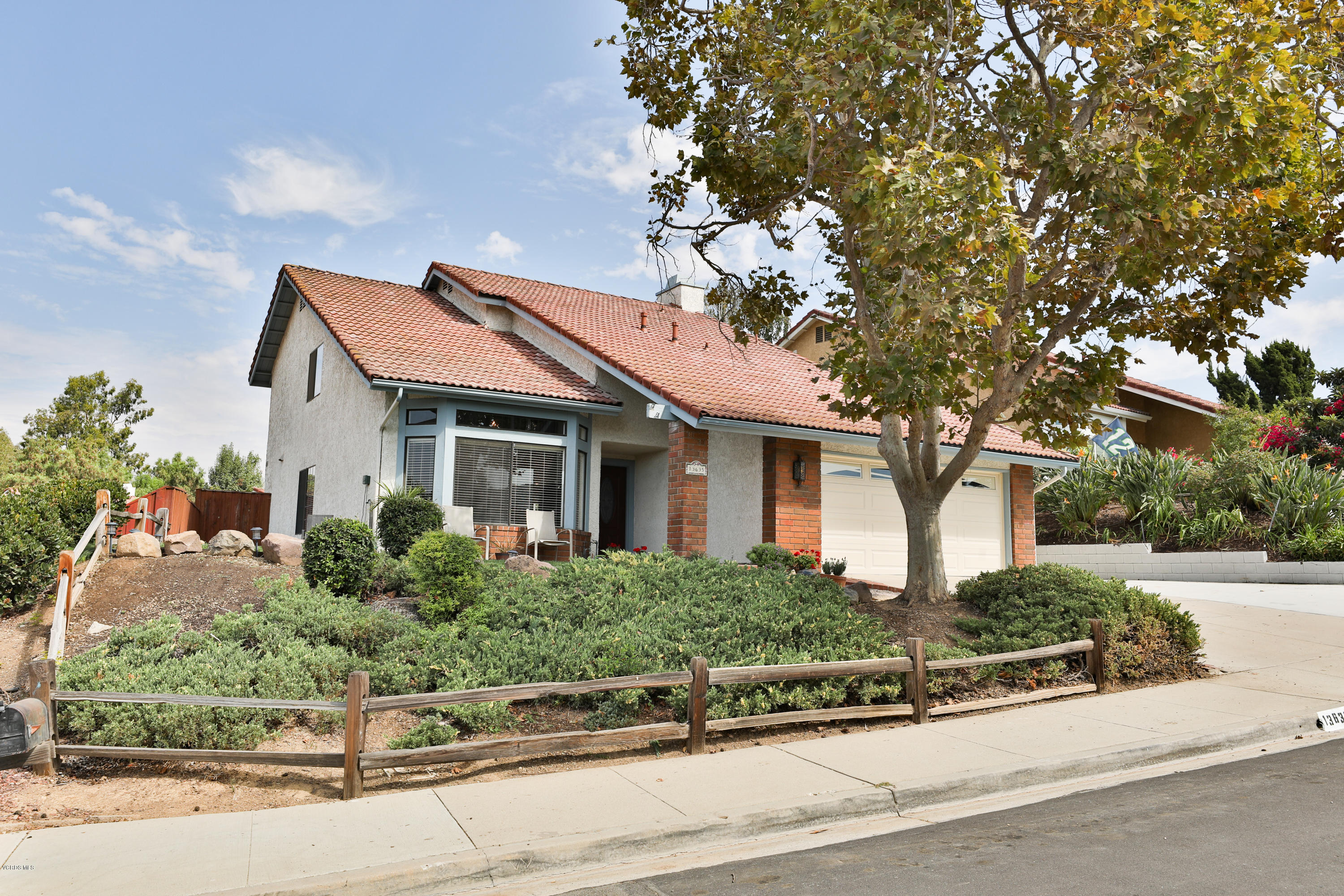 13635 Gunsmoke Road Moorpark, CA 93021 - Photo 3 of 34 front view of a house with a small yard