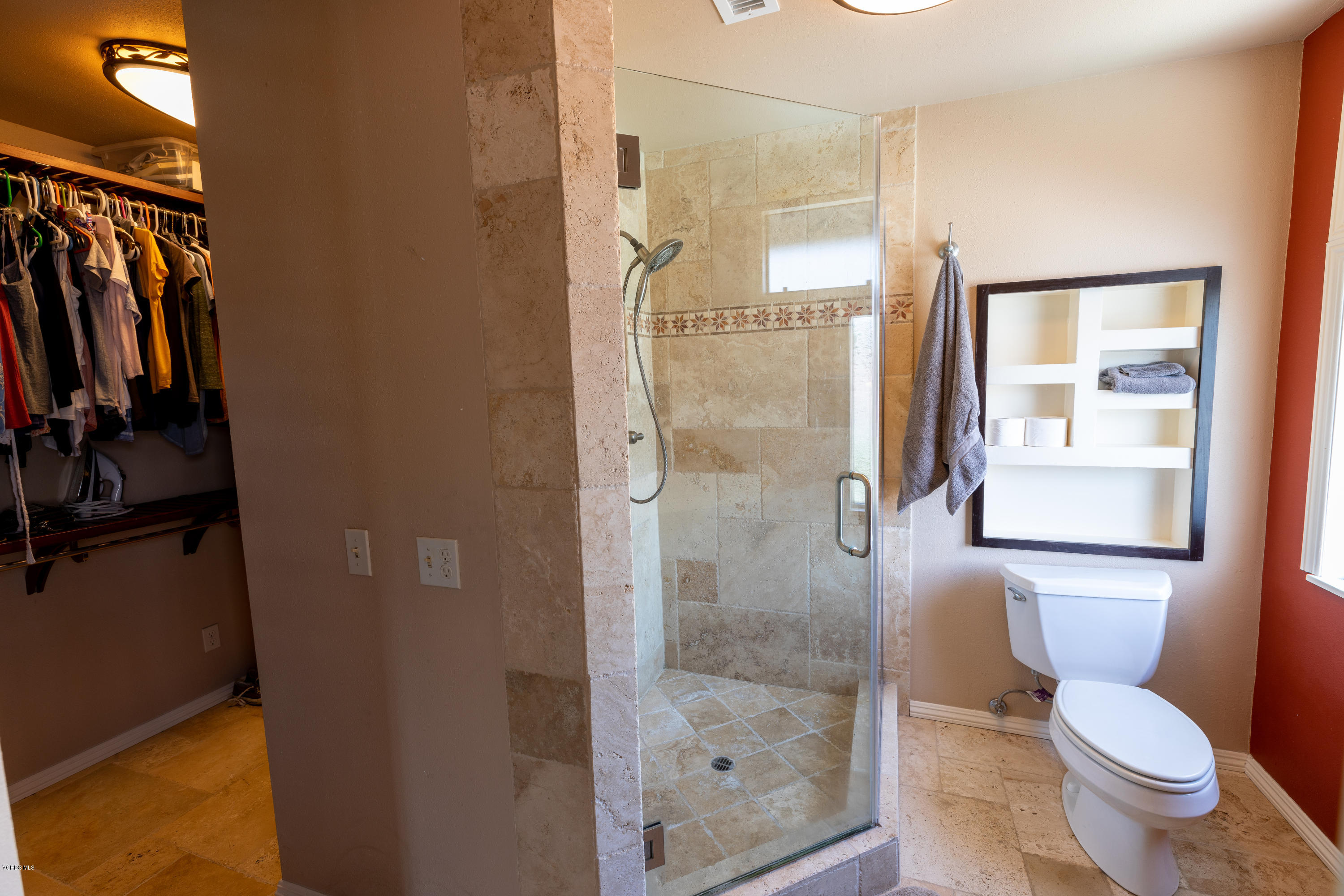 13635 Gunsmoke Road Moorpark, CA 93021 - Photo 21 of 34 a bathroom with a toilet and a shower