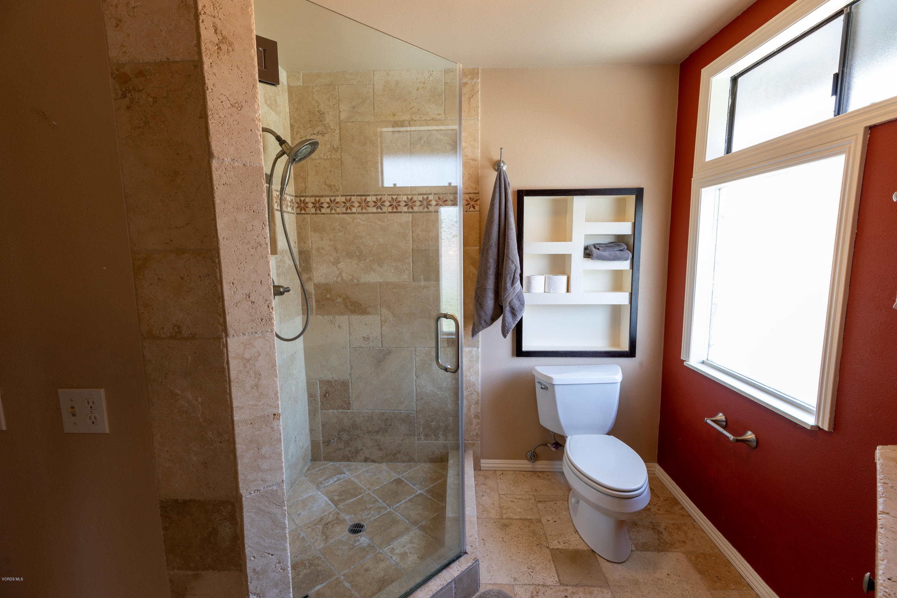 13635 Gunsmoke Road Moorpark, CA 93021 - Photo 22 of 34 a bathroom with a toilet and shower