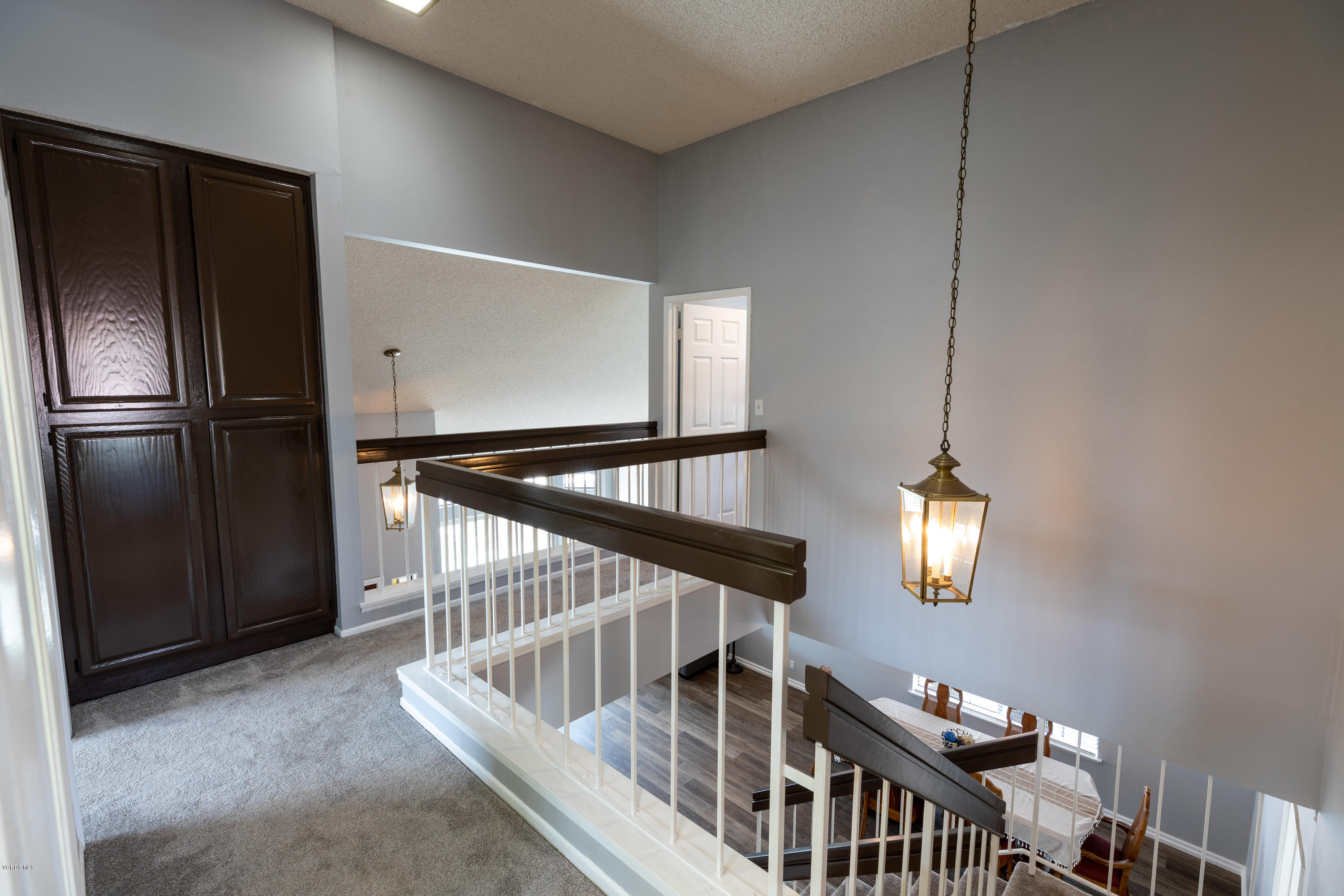 13635 Gunsmoke Road Moorpark, CA 93021 - Photo 26 of 34 a view of staircase with white walls and window