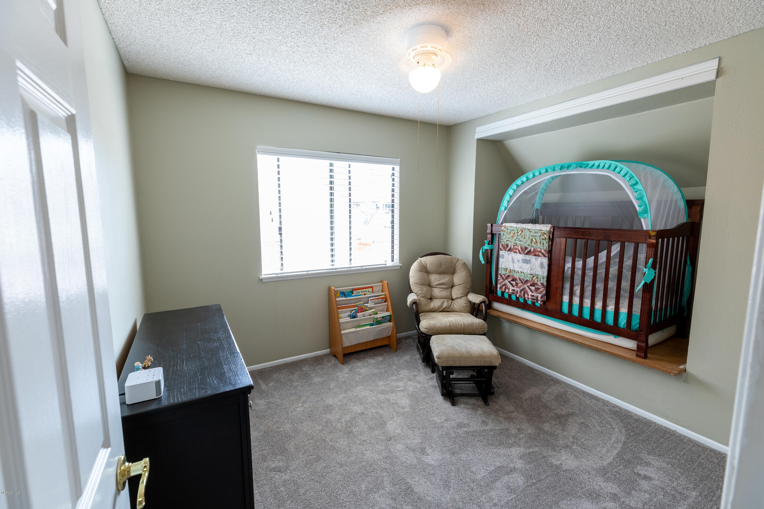 13635 Gunsmoke Road Moorpark, CA 93021 - Photo 28 of 34 a bedroom with furniture and a window