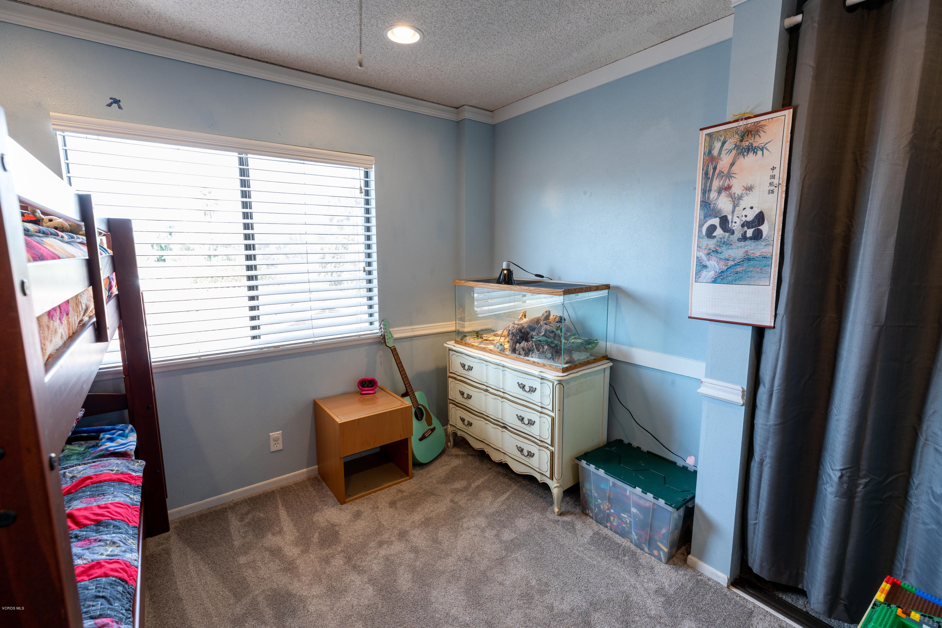 13635 Gunsmoke Road Moorpark, CA 93021 - Photo 29 of 34 a room with furniture and a window