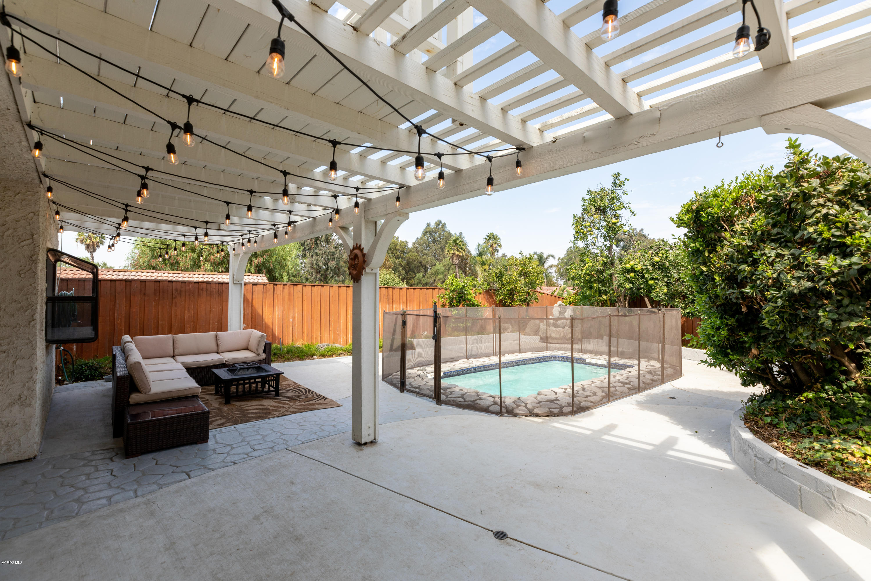13635 Gunsmoke Road Moorpark, CA 93021 - Photo 34 of 34 a view of a patio with a table and chairs