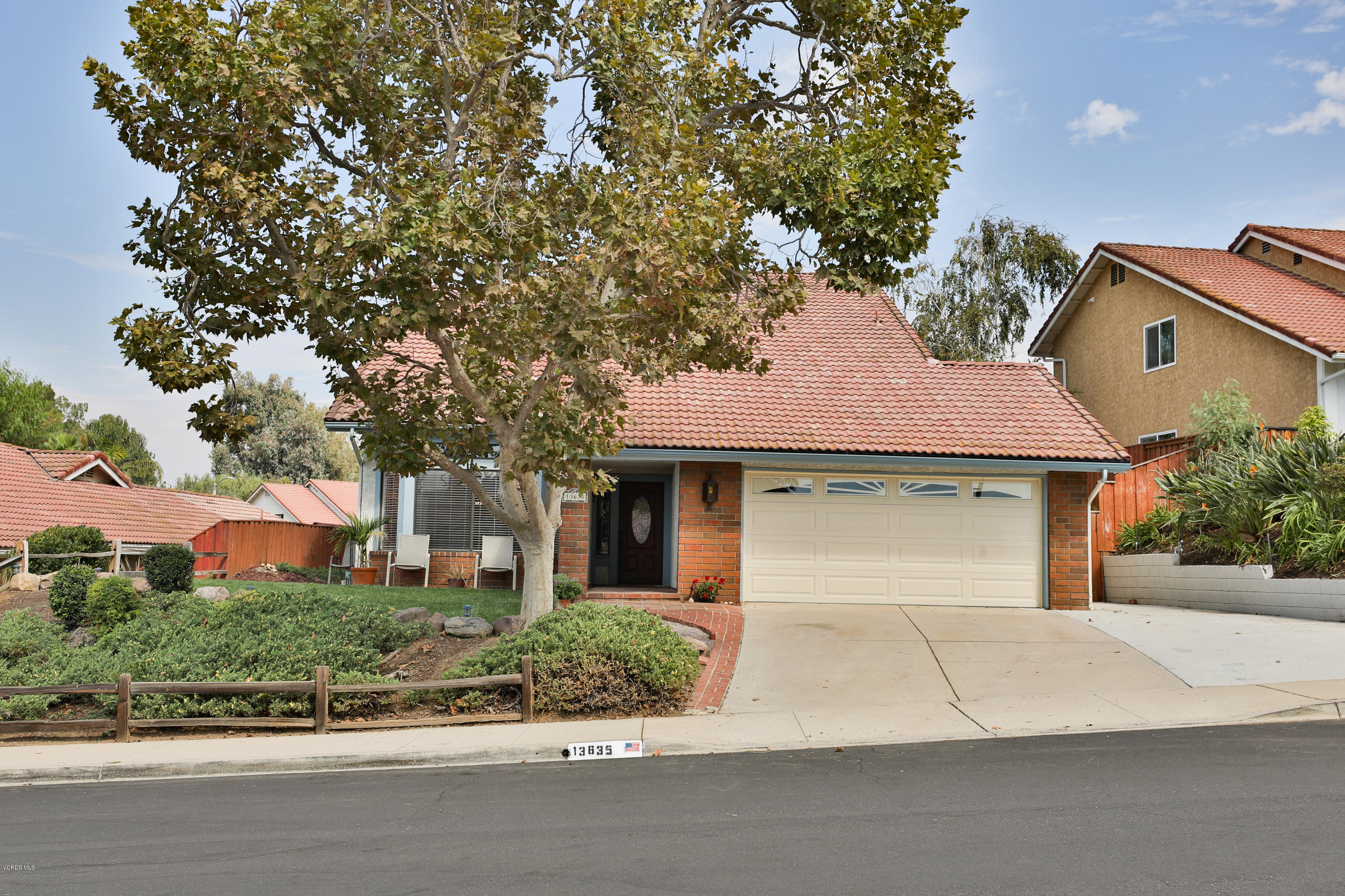 13635 Gunsmoke Road Moorpark, CA 93021 - Photo 5 of 34 front view of a house with a yard