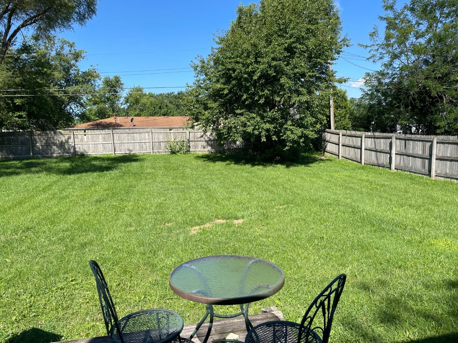 746-1 Governor Road Valparaiso, IN 46385 - Photo 13 of 13 a backyard of a house with table and chairs