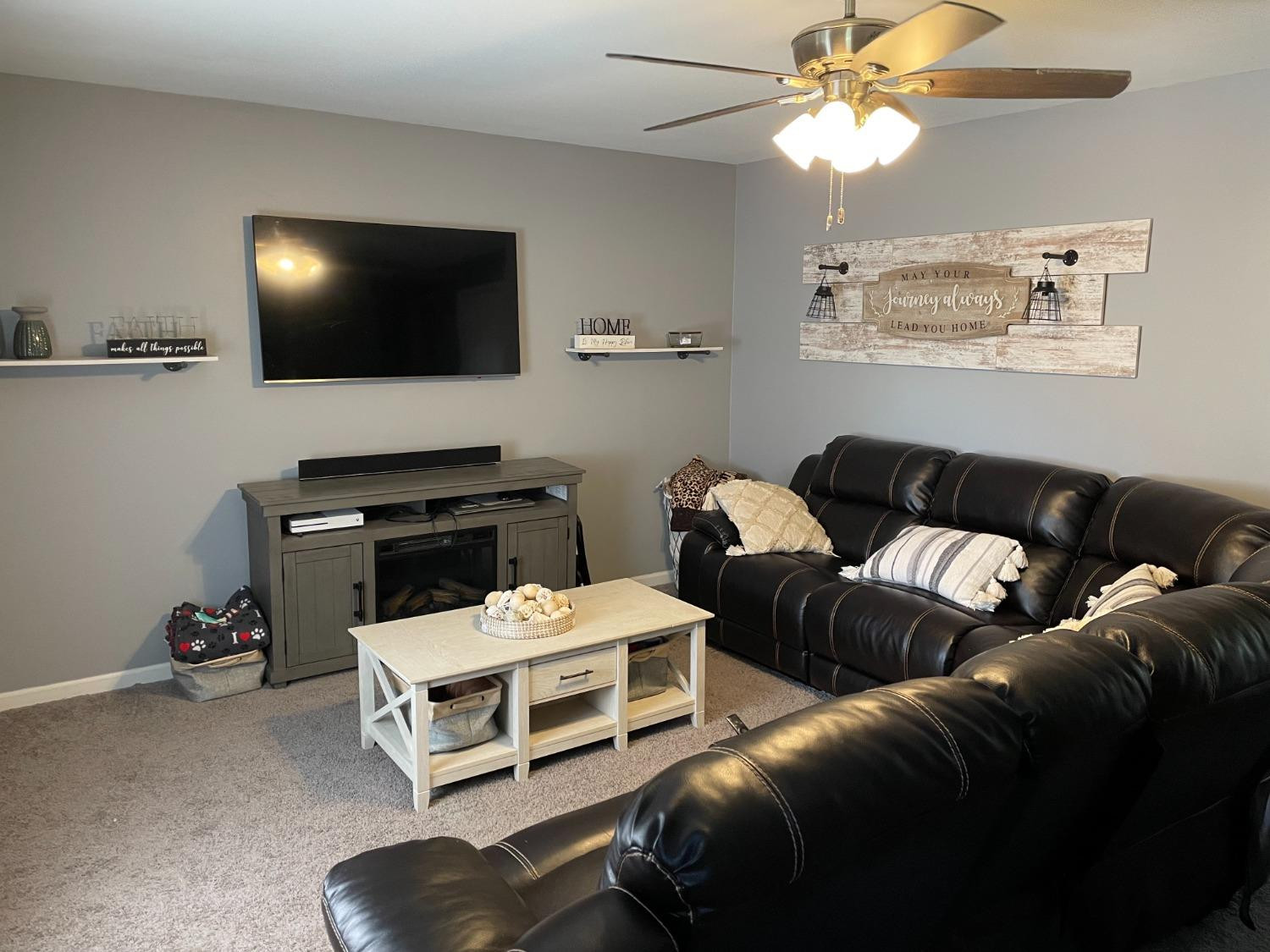 746-1 Governor Road Valparaiso, IN 46385 - Photo 2 of 13 a living room with furniture and a flat screen tv