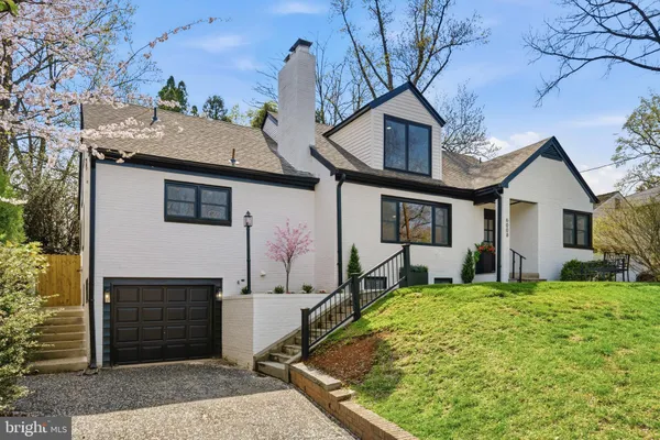 front view of a house with a yard