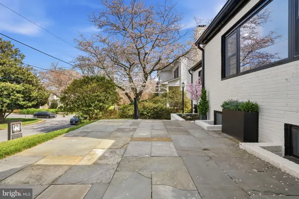 a view of a pathway with a yard