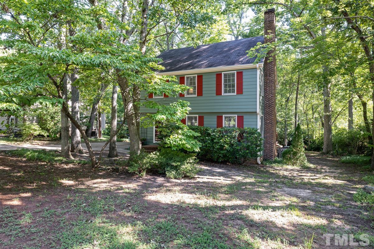 7320 Old Hundred Road Raleigh, NC 27613 - Photo 1 of 39 a view of a yard in front of a house