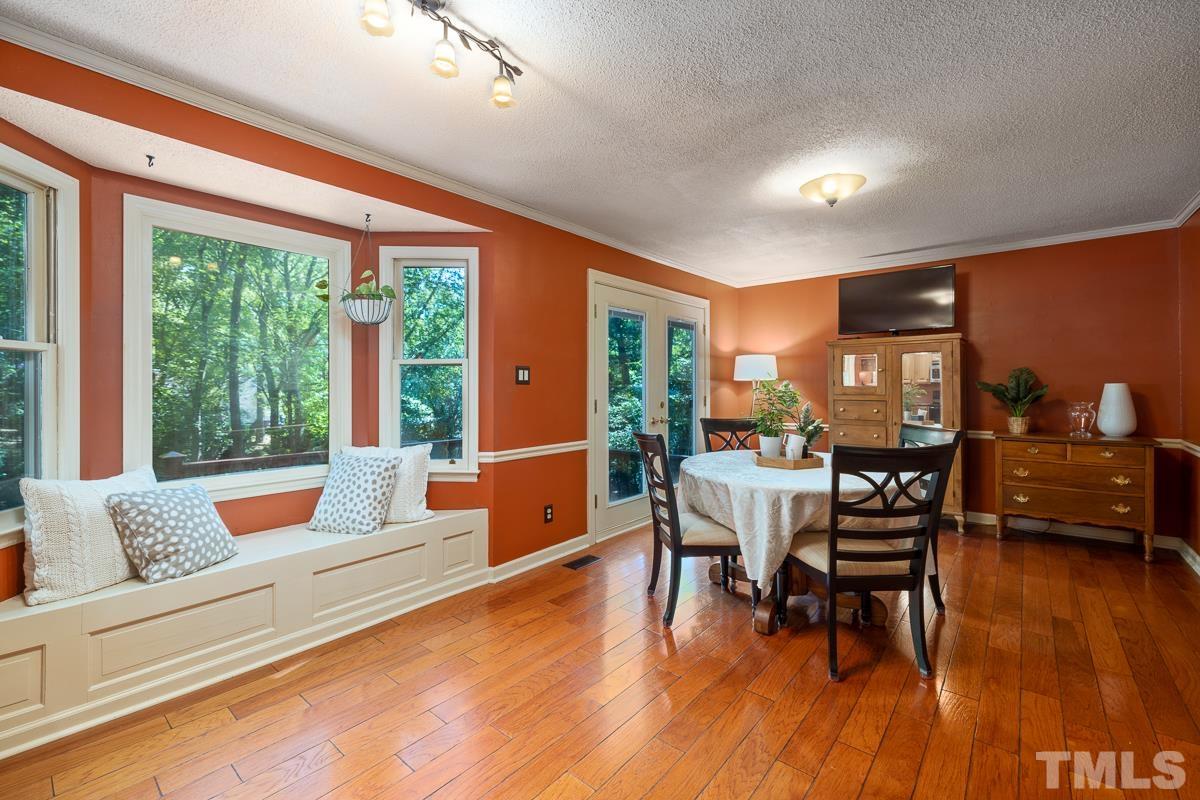 7320 Old Hundred Road Raleigh, NC 27613 - Photo 14 of 39 a living room with furniture and wooden floor