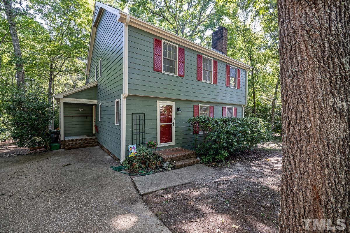 7320 Old Hundred Road Raleigh, NC 27613 - Photo 2 of 39 a front view of a house with garden