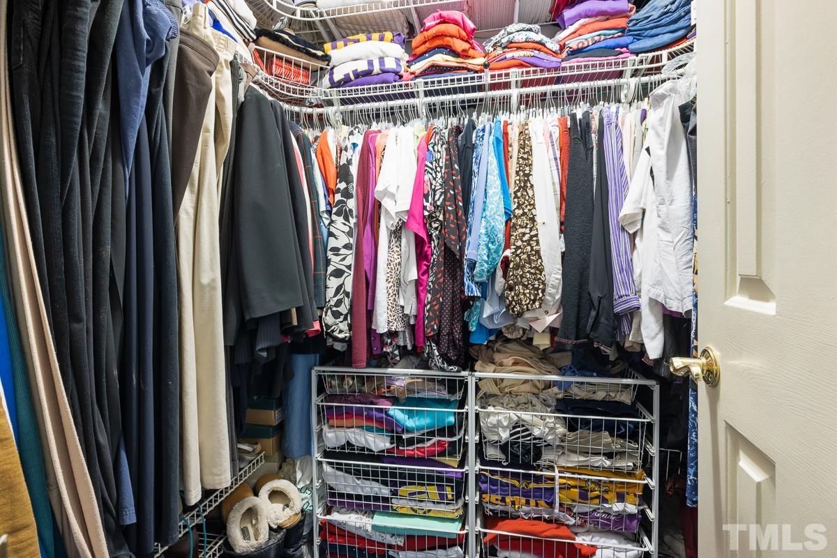 7320 Old Hundred Road Raleigh, NC 27613 - Photo 22 of 39 a view of walk in closet with clothes