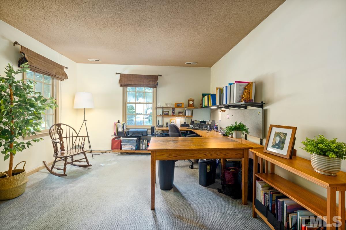 7320 Old Hundred Road Raleigh, NC 27613 - Photo 27 of 39 a view of a workspace with furniture