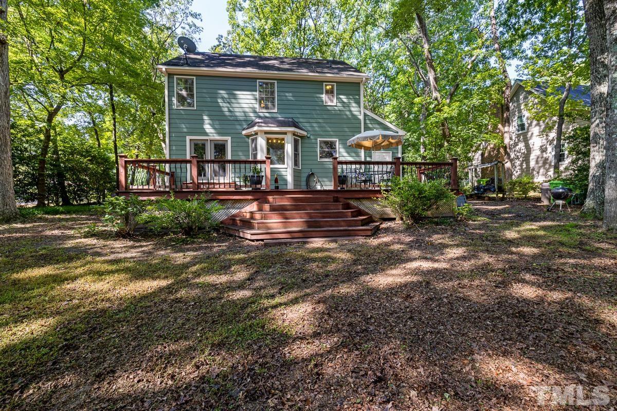 7320 Old Hundred Road Raleigh, NC 27613 - Photo 30 of 39 a front view of a house with garden