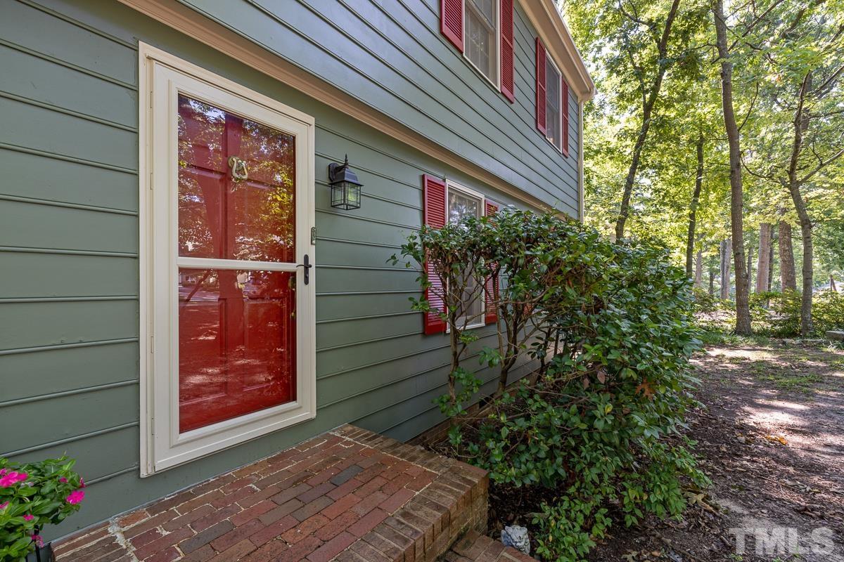 7320 Old Hundred Road Raleigh, NC 27613 - Photo 3 of 39 a backyard of a house with lots of green space