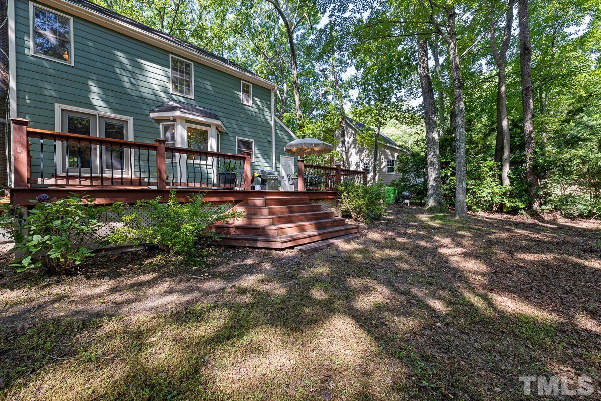 7320 Old Hundred Road Raleigh, NC 27613 - Photo 33 of 39 a view of house with yard and outdoor seating