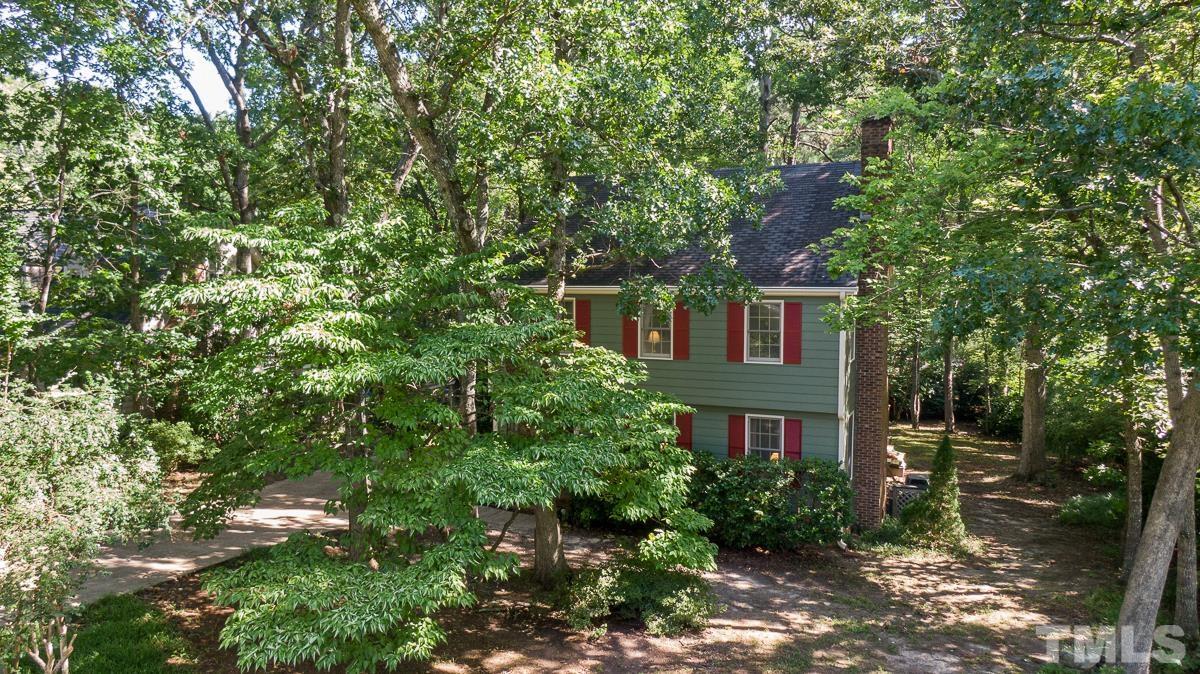 7320 Old Hundred Road Raleigh, NC 27613 - Photo 38 of 39 a front view of a house with a yard