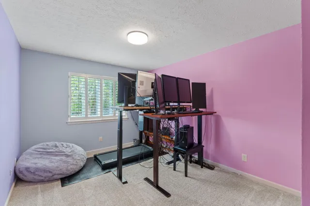 a room with furniture and a window