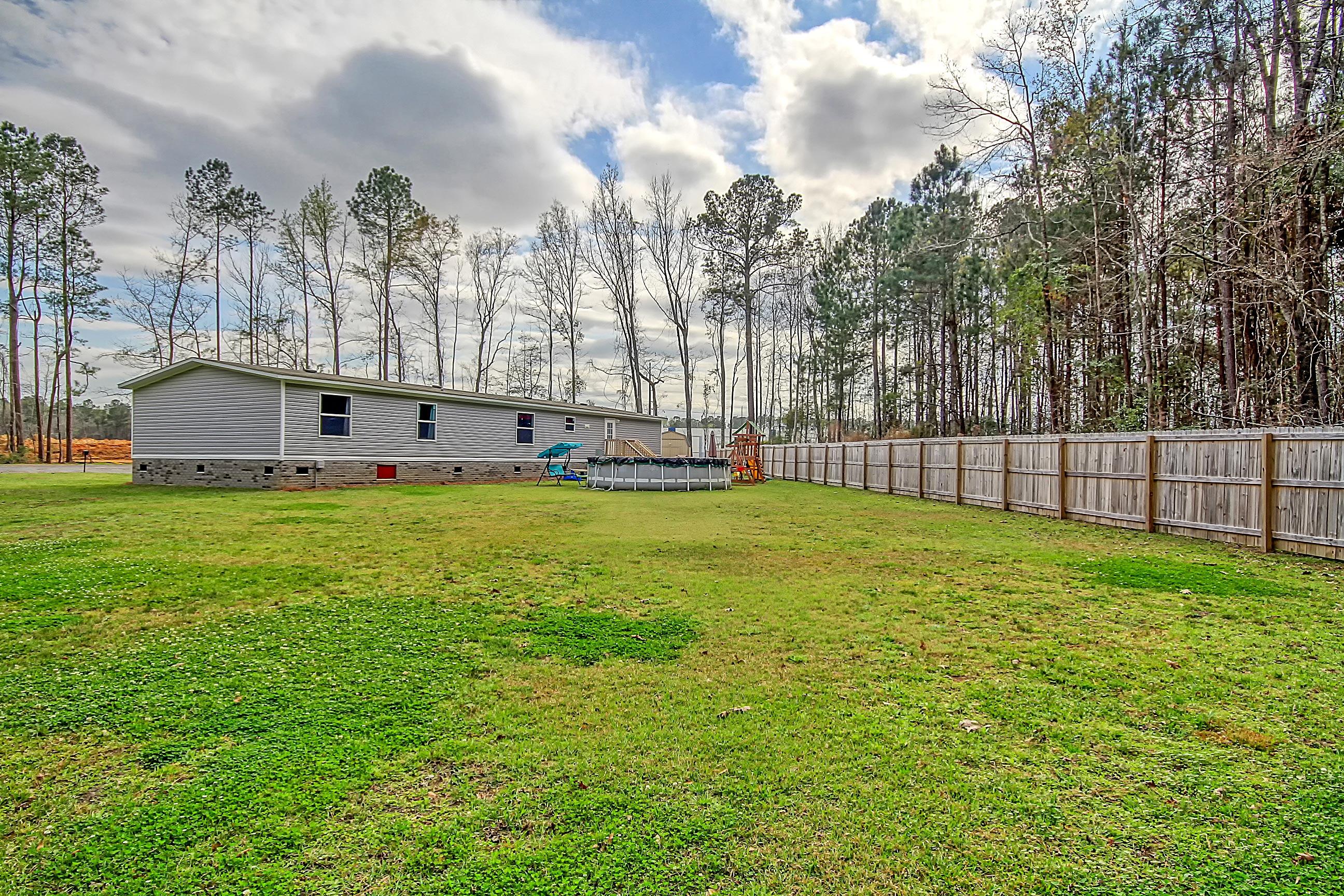 348 Nathaniel Road Summerville, SC 29486 - Photo 17 of 34 Back yard, privacy fence