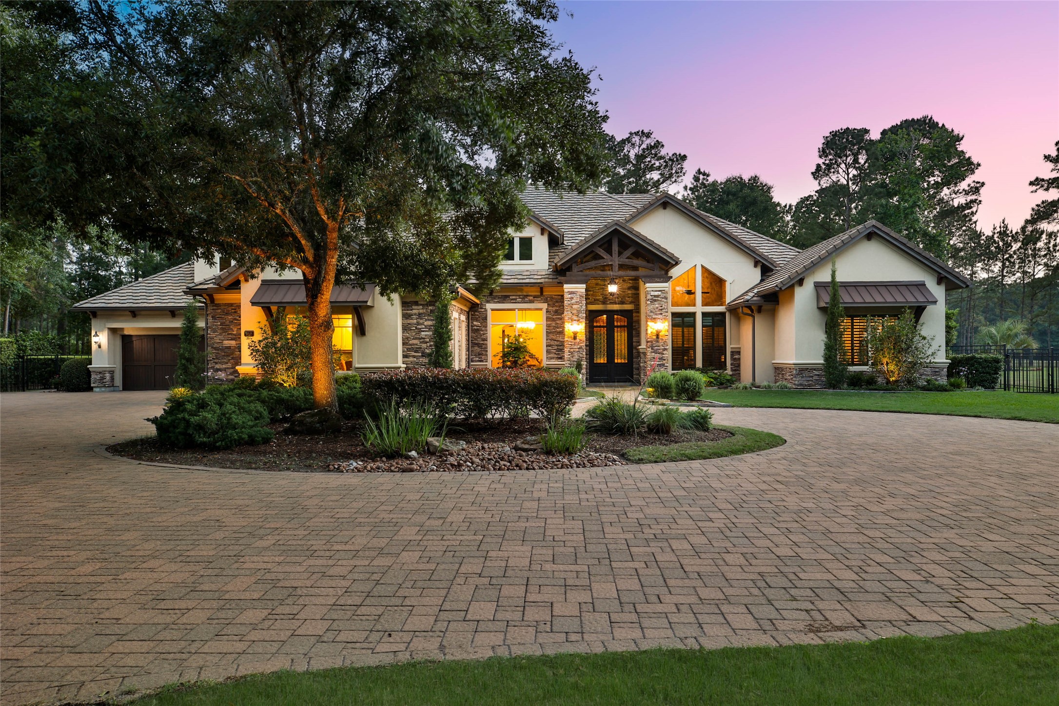 852 Eagle Pointe Montgomery, TX 77316 - Photo 44 of 48 a front view of a house with a yard and potted plants