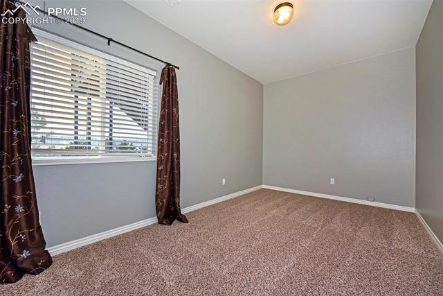 15190 Ridgefield Lane Colorado Springs, CO 80921 - Photo 25 of 31 Large lower level 6th bedroom w/Views!!