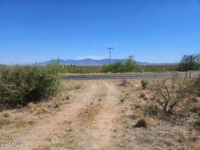 a view of lake with mountain in the background