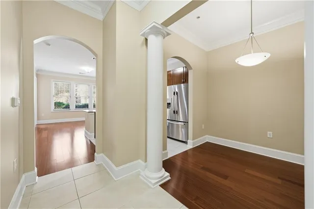 a view of livingroom with hardwood floor and kitchen view