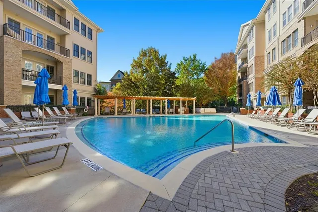 a view of a building with sitting area
