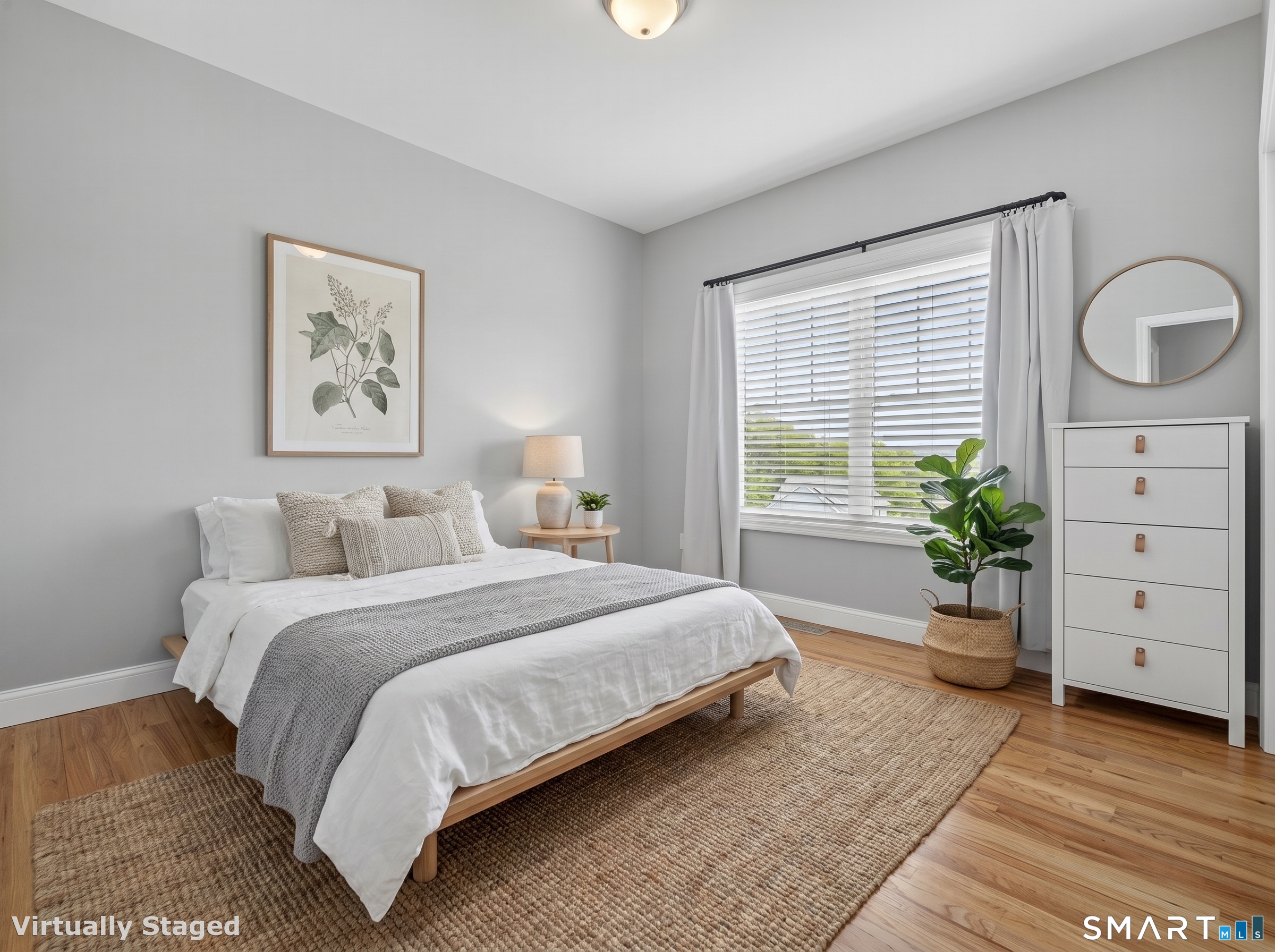 650 Ridgewood Road Middletown, CT 06457 - Photo 24 of 40 a bedroom with a bed and a potted plant