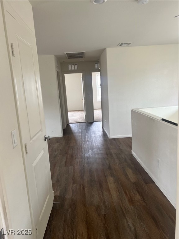 2815 Donatello Manor Place Henderson, NV 89044 - Photo 14 of 14 Hall with dark wood finished floors and baseboards
