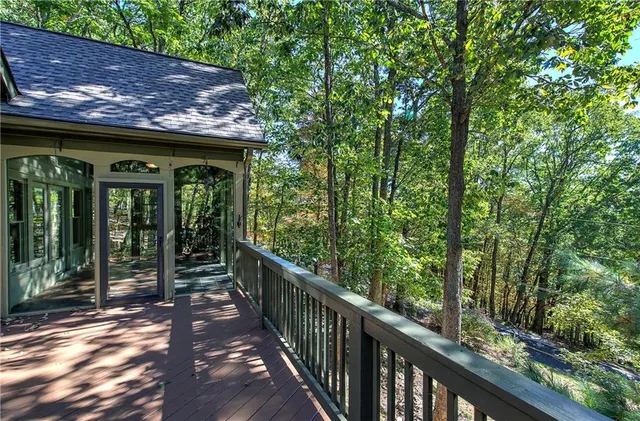 en empty room with fan and windows