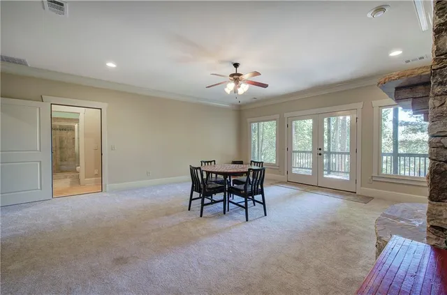 a bedroom with a bed and a night stand