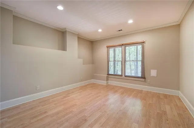 a view of a house with a tree