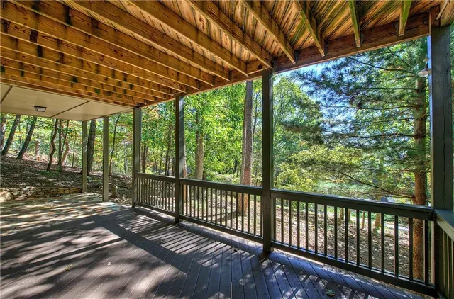 a view of yard with flowers and trees