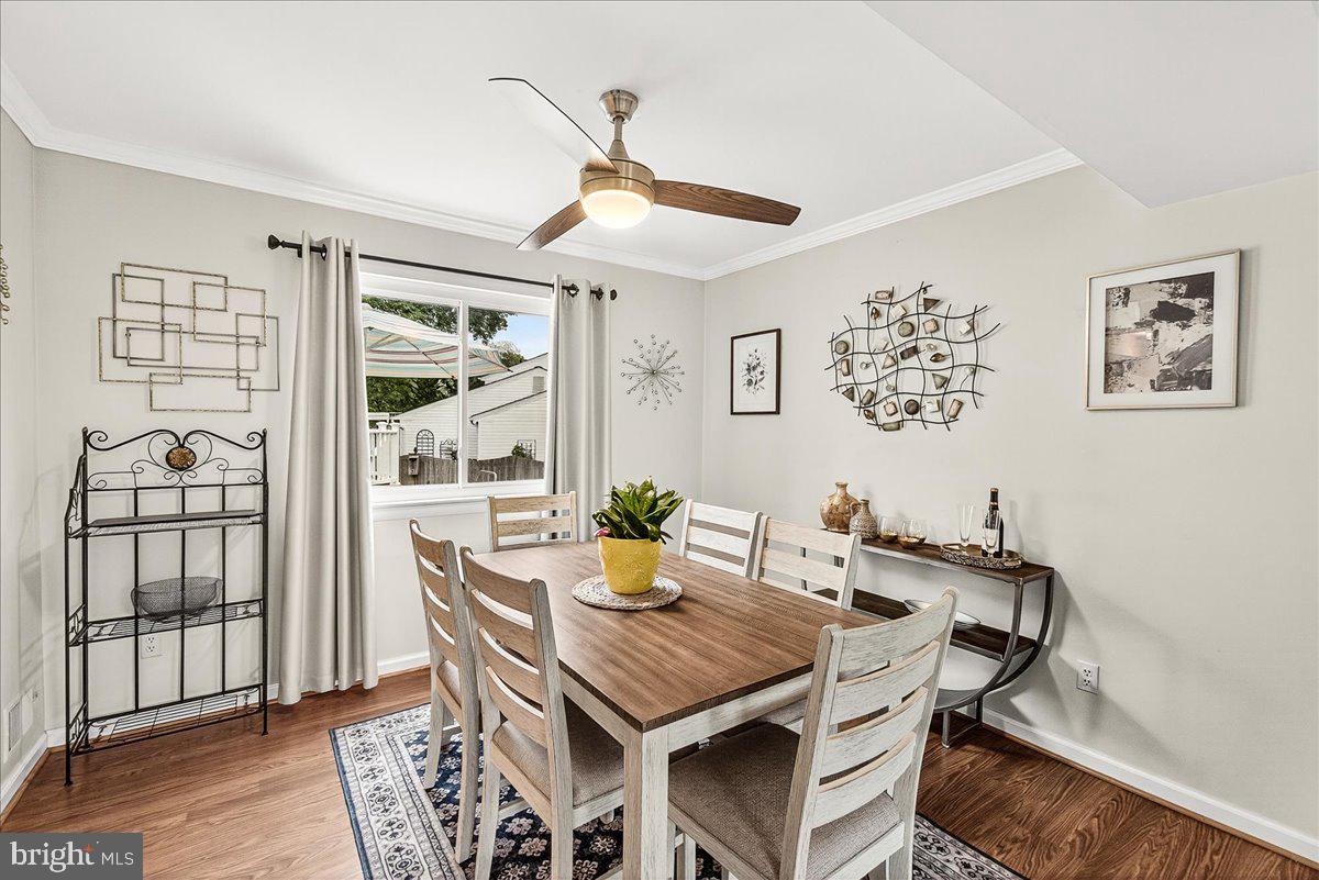 19624 Westerly Avenue Poolesville, MD 20837 - Photo 12 of 44 a view of a dining room with furniture window and wooden floor