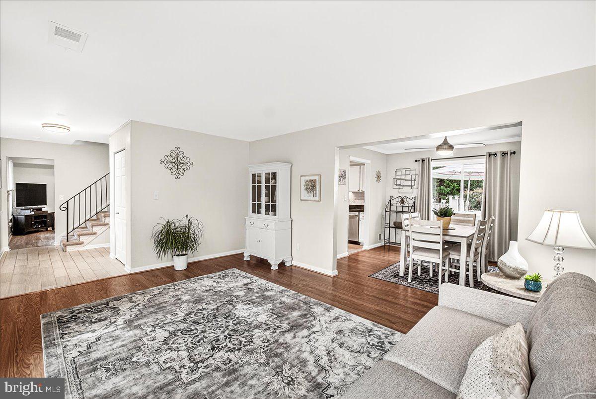 19624 Westerly Avenue Poolesville, MD 20837 - Photo 14 of 44 a living room with furniture and a wooden floor