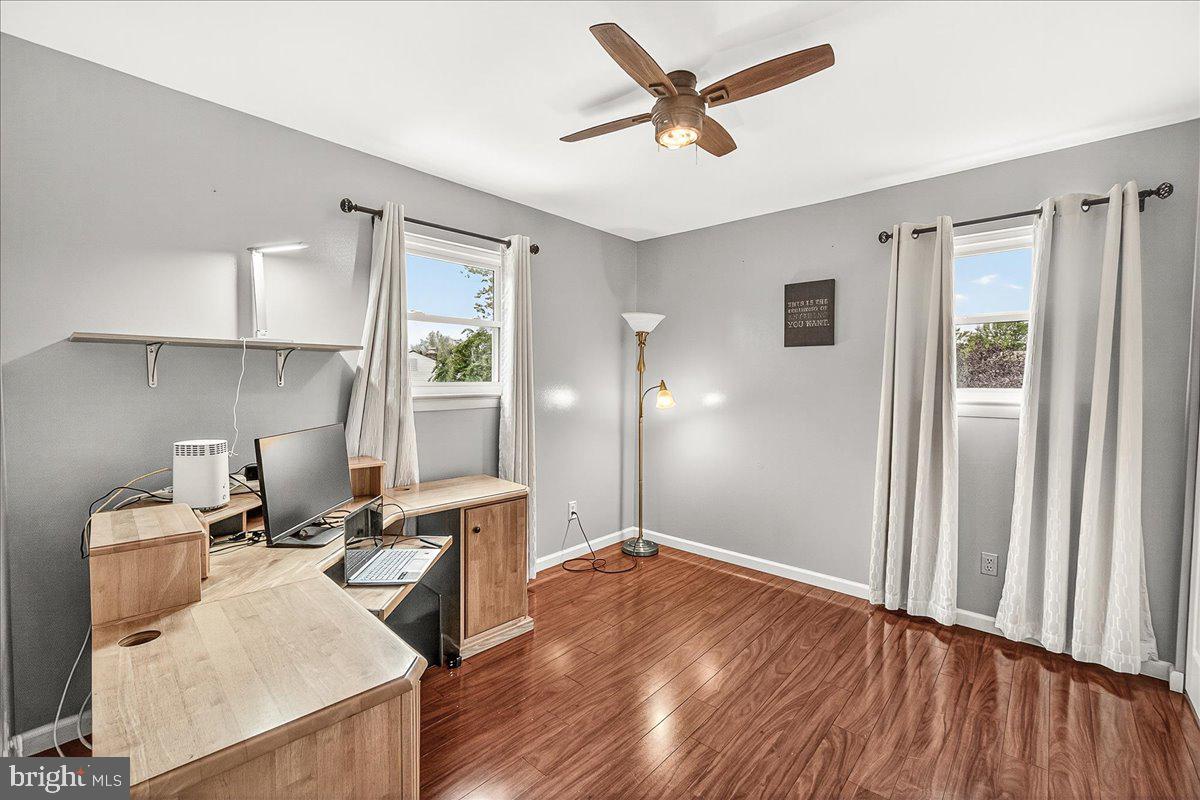 19624 Westerly Avenue Poolesville, MD 20837 - Photo 21 of 44 a view of a workspace with furniture and a window