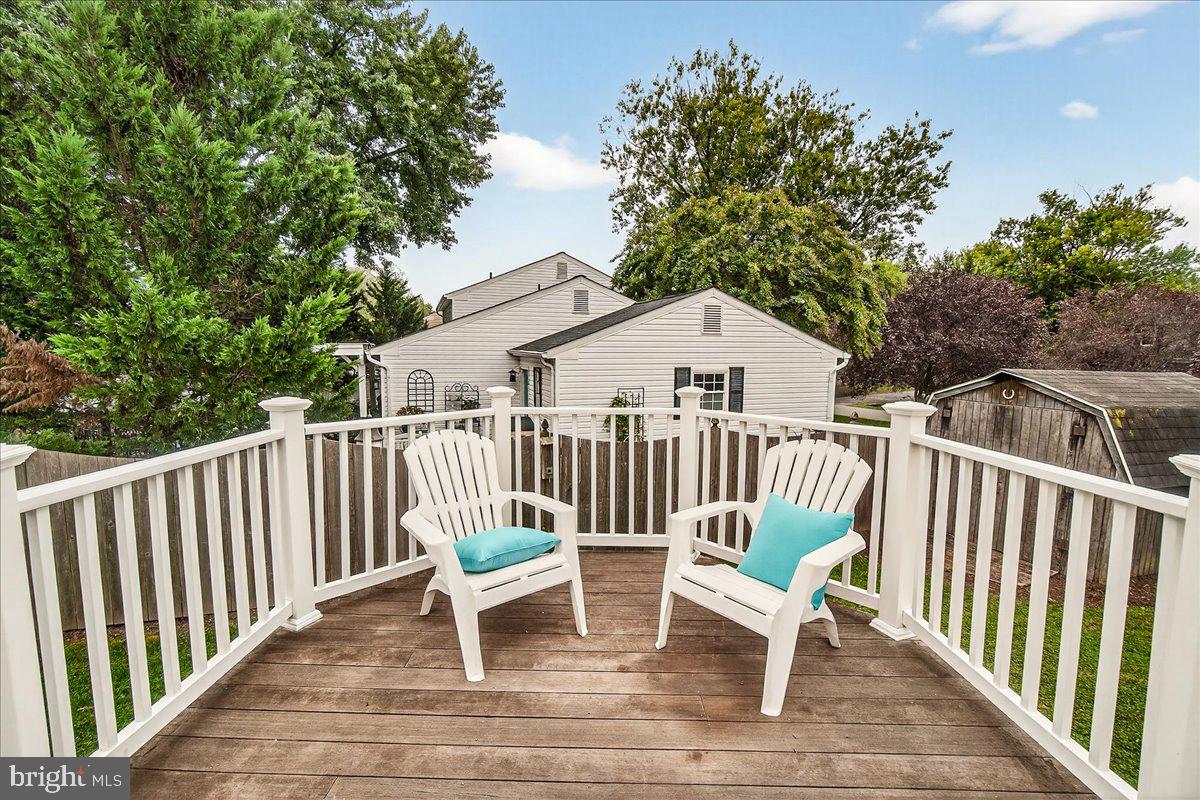 19624 Westerly Avenue Poolesville, MD 20837 - Photo 36 of 44 a view of a chair and table in the balcony
